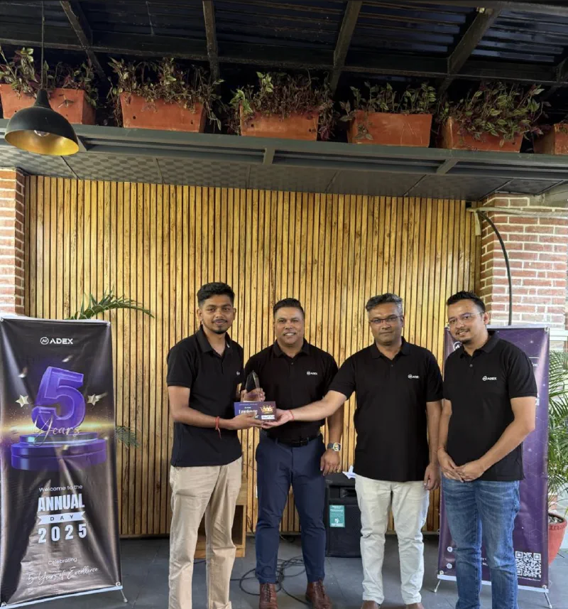 Saugat receiving the Employee of the Year 2024 award at Adex Annual Day 2025